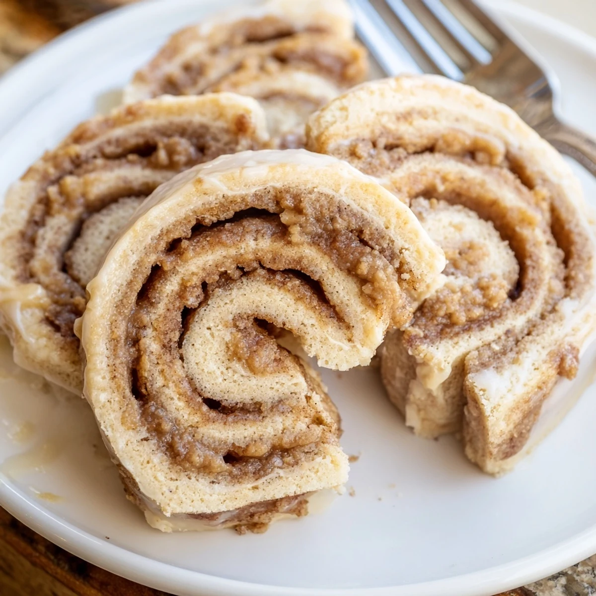 Delicious and warm Peanut Butter Cinnamon Roll Cookies sprinkled with cinnamon sugar and butter.