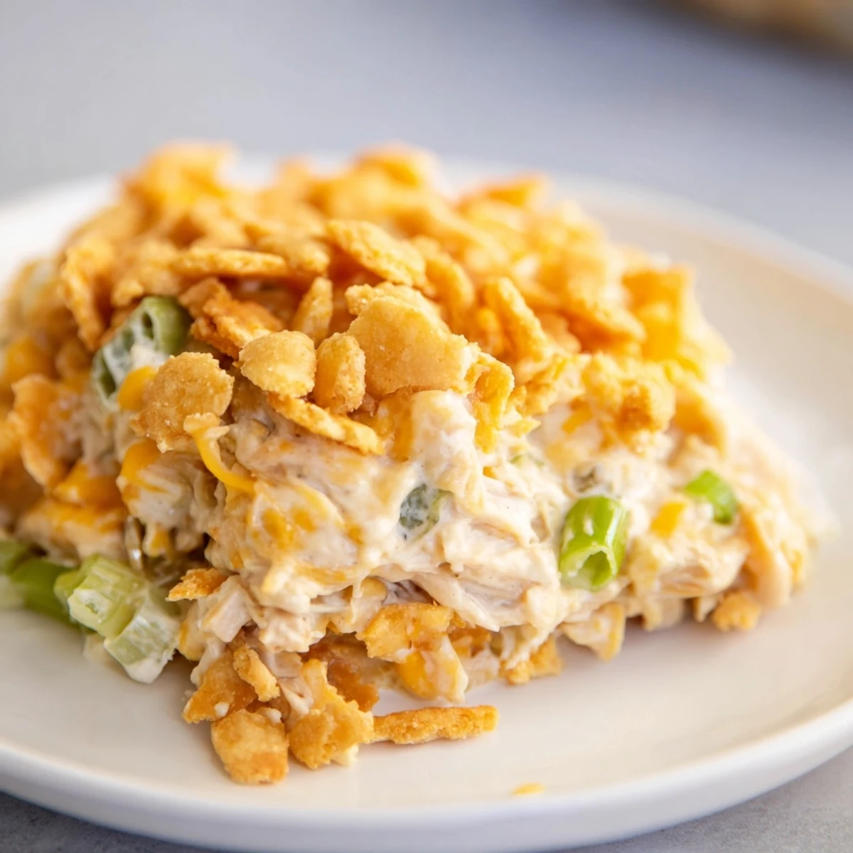 Golden-brown Neiman Marcus-Style Chicken Casserole with a buttery cracker topping, ready to serve and enjoy.