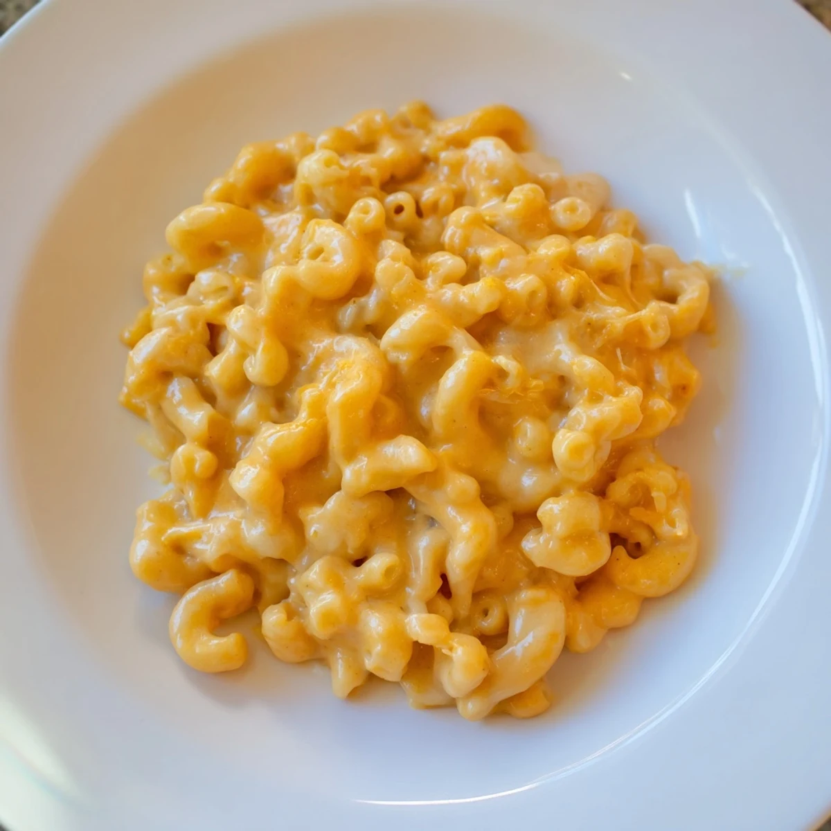Creamy One-Pot Butternut Squash Mac & Cheese, with melted cheese and tender pasta.