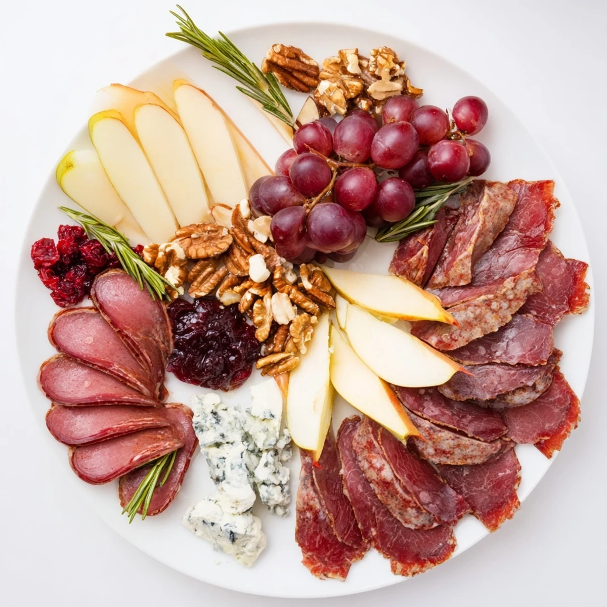 A gorgeous Majestic Venison Charcuterie Platter overflowing with meats, cheeses, fruits and nuts.