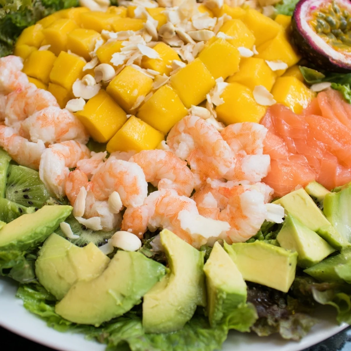 A fresh Tropical Wave Tasting Platter featuring mango, pineapple, and crunchy coconut, ready to serve and share.