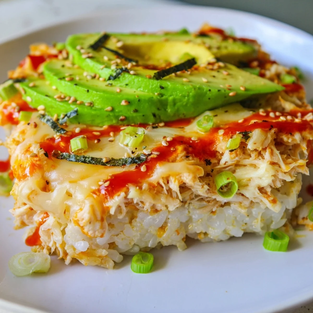 Golden-brown Chicken Sushi Bake, a creamy casserole perfect served with nori strips.