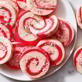 Freshly baked Candy Cane Swirl Cookie Platter showcasing beautifully swirled cookies, ready to be enjoyed with a warm drink.