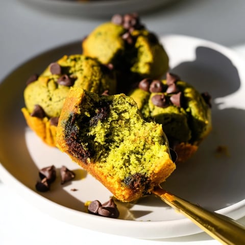 Moist Matcha Pumpkin Chocolate Muffin Bites topped with rich chocolate chips for dessert.  