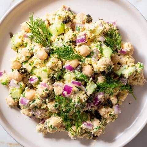 Creamy chickpea tuna salad, a vegan delight ready to be served on a sandwich.