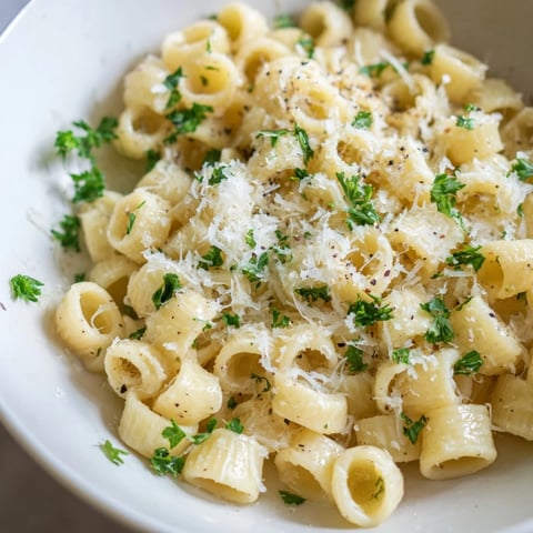 Golden bowl of one-pot garlic butter ditalini, a quick and comforting Italian-American pasta meal.