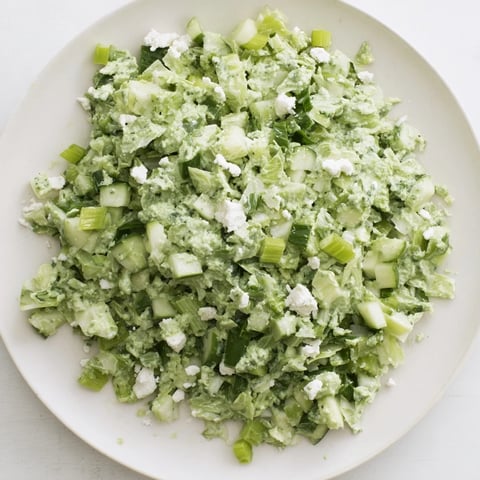 Creamy, vibrant Green Goddess Cabbage Dip, fresh and ready to scoop with crunchy tortilla chips.