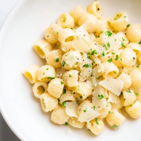 Steaming bowl of 15-Minute Creamy Garlic Butter Ditalini, rich and glossy with Parmesan and parsley.