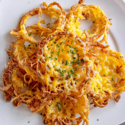 Golden, bubbly, cheesy Crispy Onion Cheese Chips, a low-carb treat perfect with a cool dip.