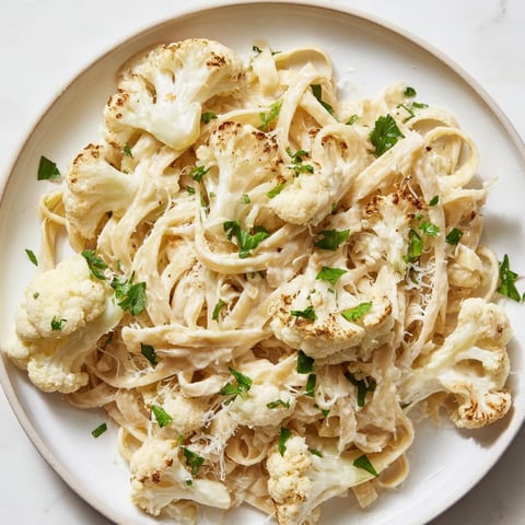 Golden roasted cauliflower Alfredo, creamy and comforting, perfect Italian-inspired vegetarian dinner.