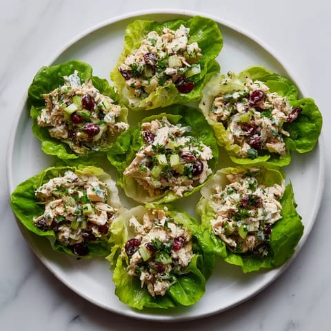 A plate of food with lettuce wraps.