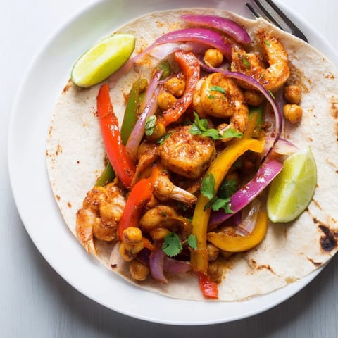 Vibrant Shrimp &amp; Chickpea Sheet Pan Fajitas spread ready for roasting to perfection.