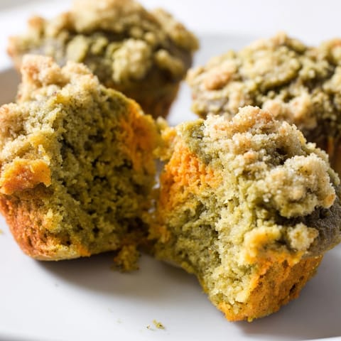 Golden-brown Matcha Pumpkin Muffins with Streusel showcased; enjoy with a cozy cup of tea.