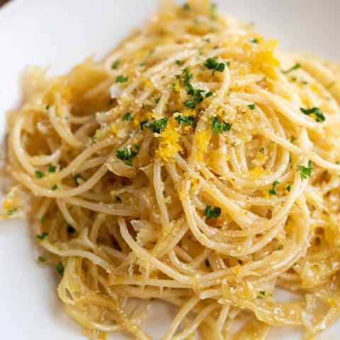 Comforting Cabbage Pasta with garlic and Parmesan served in a warm skillet for weeknight dinner.  