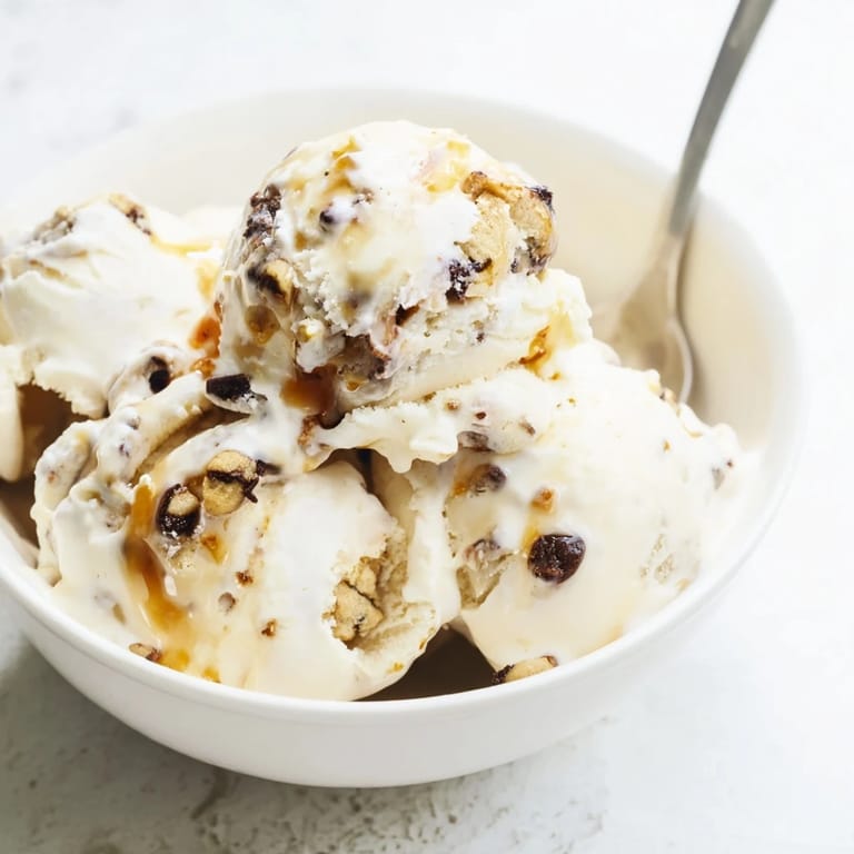 Indulgent Cottage Cheese Ice Cream with Cookie Dough, topped with mini chocolate chips.  