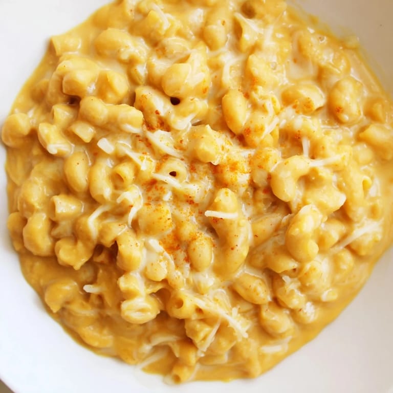 Golden, cheesy one-pot butternut squash mac & cheese, swirled with tender squash for a flavorful meal.