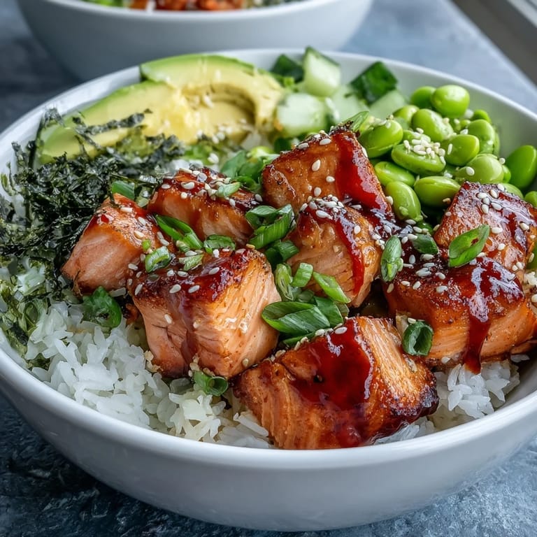 Enjoy this easy, Asian-inspired Salmon Rice Bowl bursting with fresh, delicious flavors.
